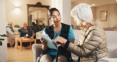 Buy stock photo Caregiver, tablet and old woman on sofa with conversation, support or consultation in nursing home. Homecare, senior person with cane and nurse with healthcare, feedback and review in living room