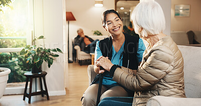 Buy stock photo Elderly care, caregiver and old woman on sofa with conversation, support or comfort at nursing home. Homecare, senior person with cane and nurse with healthcare, discussion and advice in living room