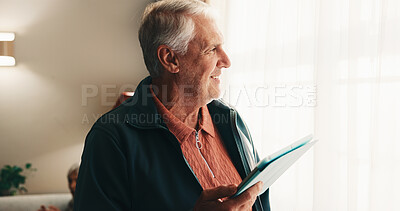 Buy stock photo Senior, thinking and happy man with tablet in retirement home for vision, daydreaming or free time. Thoughtful, elderly or male person contemplating with smile or technology for holiday in house