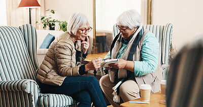 Buy stock photo Smile, old people and reading at house with crossword, word search and quiz for health. Senior friends, helping or book in home with sudoku games, problem solving and puzzle activity for brain teaser