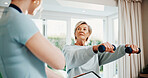 Weights, consulting and senior woman for physiotherapy, rehabilitation and mobility for arthritis. Healthcare, physical therapist and patient with dumbbells for wellness, healing and muscle strength