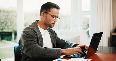 Buy stock photo Remote work, man and typing on laptop in home for financial reporting, external audit and taxes. Freelancer, accountant and research with tech in house for company bookkeeping, data entry and payroll