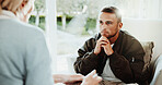 Psychology, therapist and man in consultation, listening or stress for mental health evaluation. Counseling session, patient and person with thoughts for ptsd, anxiety assessment and help in office