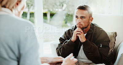 Buy stock photo Psychology, therapist and man in consultation, listening or stress for mental health evaluation. Counseling session, patient and person with thoughts for ptsd, anxiety assessment and help in office