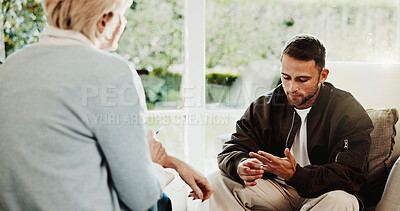 Buy stock photo Psychology, therapist and man in marriage counseling, stress for mental health evaluation. Therapy session, patient and person with ring, divorce anxiety and help to process separation in office