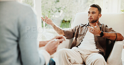 Buy stock photo Psychologist, counseling and man in consultation, speaking or stress for mental health evaluation. Therapy session, patient and person with story for ptsd, anxiety assessment and help in office