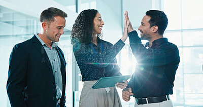 Buy stock photo High five, teamwork and business people in office with tablet, goal or good news on finance report. Happy, digital technology and group of financial advisors with celebration for investment revenue.