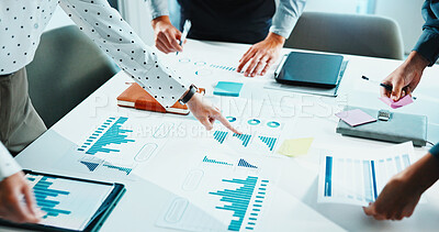 Buy stock photo Business, hands and pointing with documents for analytics, performance meeting or review in office. People, employees or analyst with team, graph or chart for data analysis or revenue in workplace