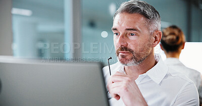 Buy stock photo Glasses, man and thinking with computer in office for trade execution, risk assessment or planning. Coworking, mature trader and tech with insight on live stock prices, market monitoring and eyewear