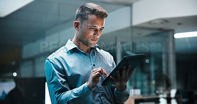 Buy stock photo Night, tablet and business man in glass office for planning, financial report and audit deadline. Accounting, reading and person on tech for finance review, proposal or research for investment budget