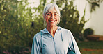 Outdoor, portrait and senior woman with yoga mat for exercise, wellness or active for health. Morning, happy and person with equipment for pilates, fitness routine and hobby for wellbeing in backyard