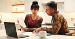 Finance, woman or couple with documents in home for bills discussion, budget planning or support. Laptop, mature people or explain with invoice for financial summary, tax filing or asset management