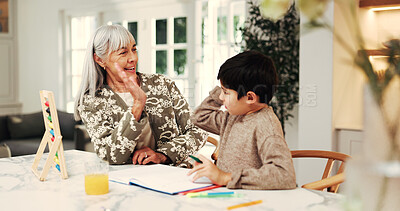 Buy stock photo Child, grandma and high five with homework, excited and book for support, celebration or education in home. People, grandmother and boy for success, learning and goal for development at family house