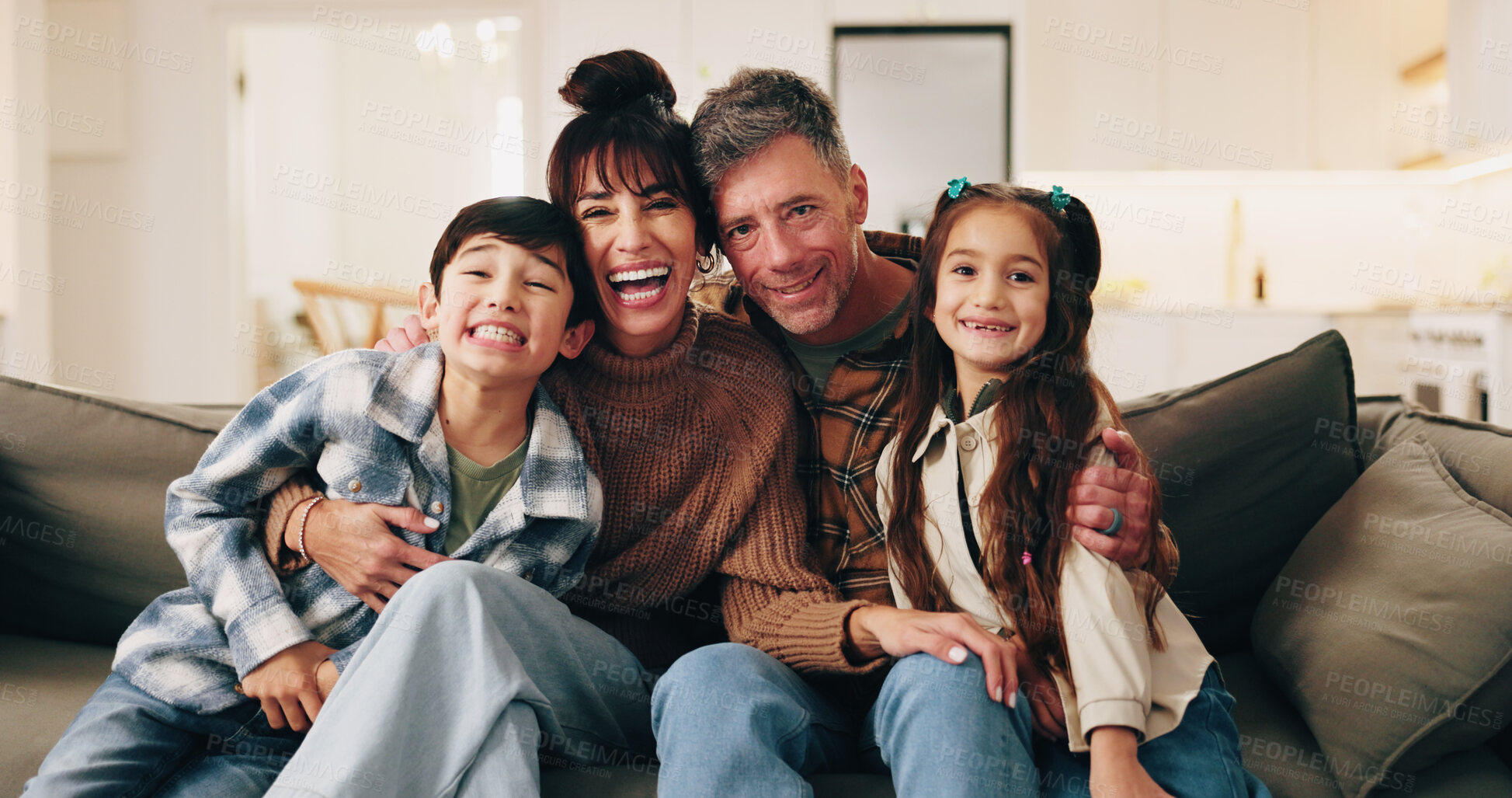 Buy stock photo Family, love and portrait in home with happiness, bonding and laughing together with parents. Smile, mother and father with children on sofa in lounge for connection, support and siblings relax