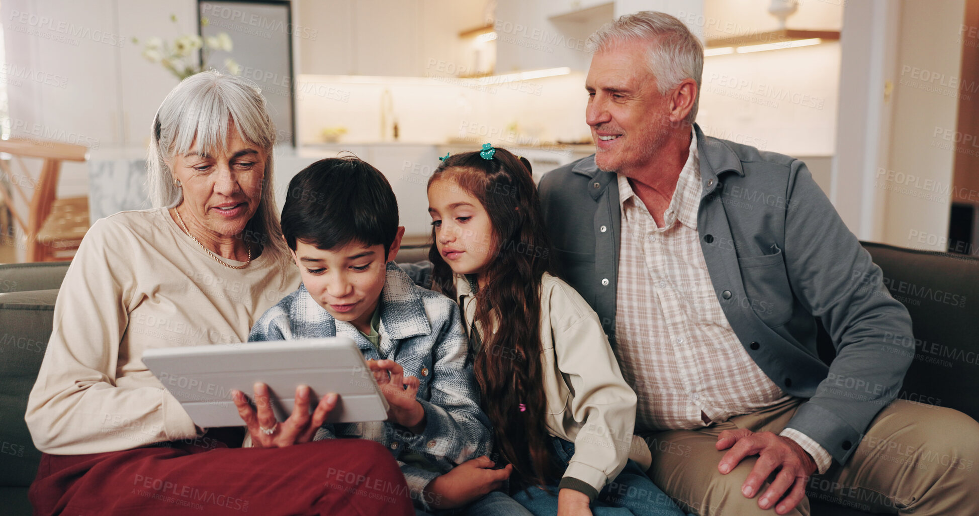 Buy stock photo Support, grandparents or kids with tablet in home for online game, bonding activity or weekend visit. Care, senior people and children with tech for digital puzzle, relationship development and happy