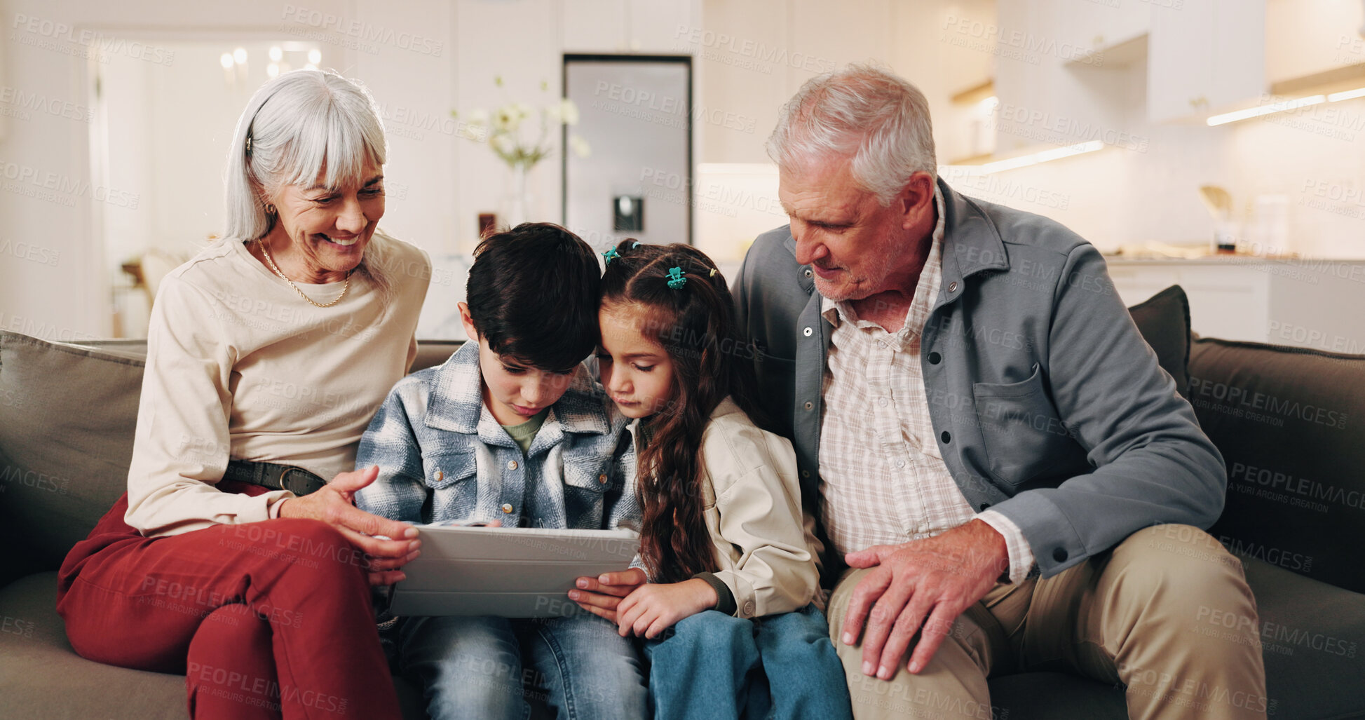 Buy stock photo Care, grandparents or kids with tablet in home for online game, bonding activity or weekend visit. Happy, senior people and children with tech for digital puzzle, relationship development and support