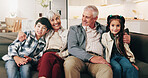 Happy family, love and children in home with grandparents, bonding and portrait together. Smile, grandmother and grandfather with kids on sofa in lounge for connection, support and siblings relax