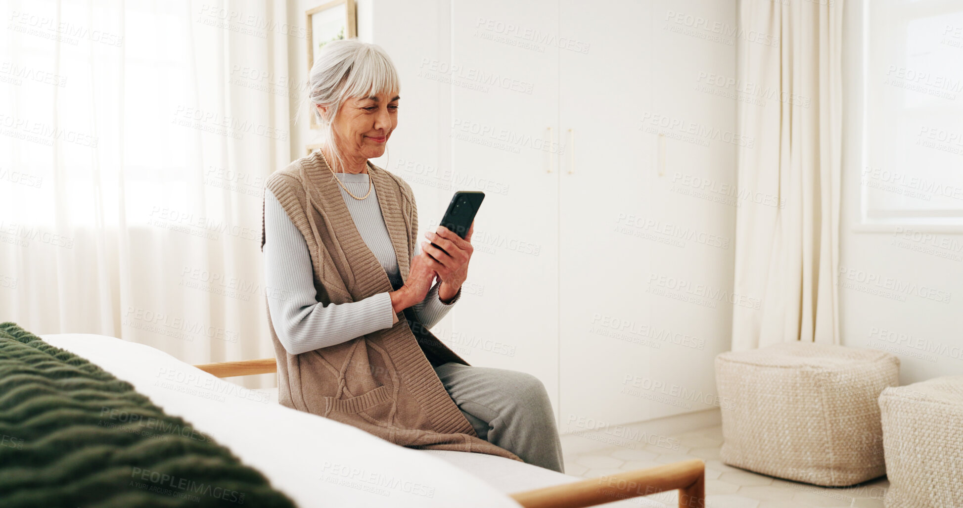 Buy stock photo Bedroom, chat and senior woman with phone, online and communication with contact on social media app. Reading, message and happy person with mobile on bed, texting and networking on website in house