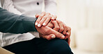 Holding hands, support and nurse with senior man in home for comfort, help or assistance at checkup. Healthcare, empathy and caregiver with elderly patient for medical consultation in apartment.