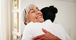 Hug, nurse and senior woman in home for rehabilitation, healthcare or support at consultation. Happy, trust and caregiver embracing elderly person in retirement for comfort at checkup in house.