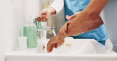 Buy stock photo Support, nurse and old person at sink with handwashing, bacteria prevention or wellness in elderly care. Safety, senior man or caregiver in home with water, germ protection or hygiene in retirement