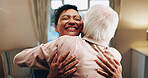 Happy, hug and nurse with senior person for support, bonding and care for assisted living. Retirement, nursing home and caregiver embrace elderly patient for connection, wellness and trust for help
