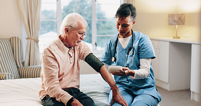 Buy stock photo Woman, nurse and senior patient with blood pressure machine on bed for health checkup or visit. Female person, healthcare worker or caregiver monitoring with arm strap for heart rate or exam in home