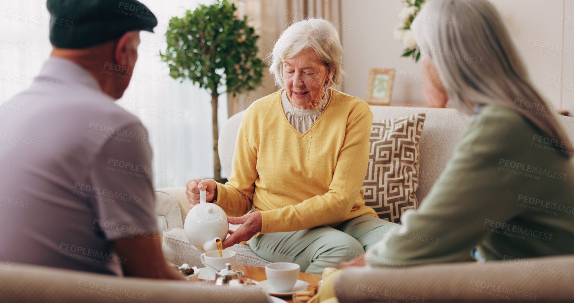 Buy stock photo Friends, tea party and visit with old people in home for bonding, retirement and together. Drinks, relax and social reunion with senior group in living room for breakfast, gossip or chat in house