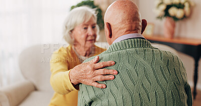 Buy stock photo Comfort, hand and shoulder with old people in home living room for bonding, support or wellness. Consoling, empathy and love with senior friends in apartment together for grief, loss or pain