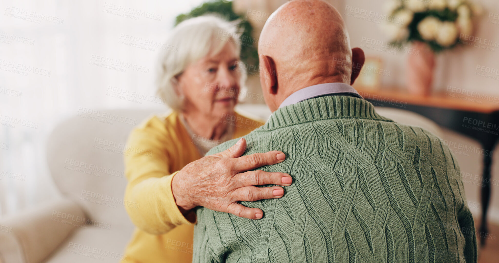 Buy stock photo Comfort, hand and shoulder with old people in home living room for bonding, support or wellness. Consoling, empathy and love with senior friends in apartment together for grief, loss or pain