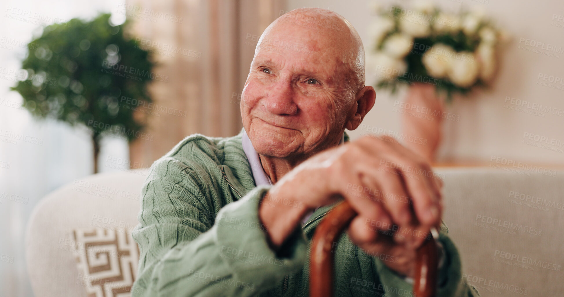 Buy stock photo Cane, reflection and smile of old man on sofa in living room of home for retirement or wellness. Break, thinking and walking stick with happy senior in apartment for optimism, peace or satisfaction