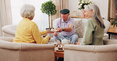 Buy stock photo Friends, tea party and old people with cupcakes in home for bonding, retirement or snack together. Drinks, relax and social reunion with senior group in living room for visit, chat or gossip in house