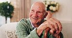 Cane, smile and thinking with old man on sofa in living room of home for retirement or wellness. Break, nostalgia and walking stick with happy senior person in apartment for memories or reflection