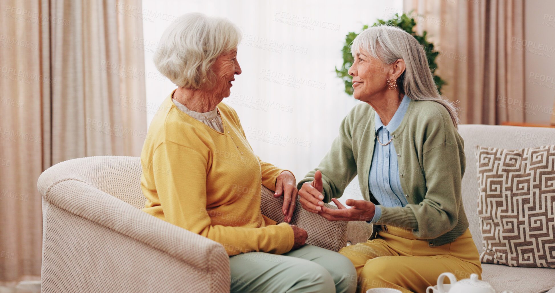 Buy stock photo Friends, conversation and support with old women in home for bonding, good news or retirement. Happiness, love and social reunion with senior people in living room for chat, smile and care in house