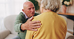Consoling, hand and shoulder with old people in home living room for bonding, support or wellness. Comfort, empathy and love with senior friends in apartment together for grief, loss or pain