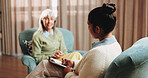 Therapy, writing and woman in office for counseling, healing and help for mental health in retirement. Psychology, psychologist and elderly person in session for support, notes and consultation