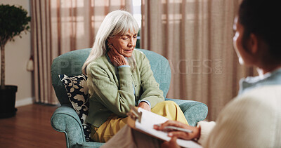 Buy stock photo Therapy, sad and senior woman in office for grief counseling, healing and help for mental health. Retirement, psychologist and elderly person with depression, explain trauma and support in session