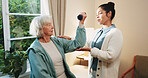 Dumbbell, fitness and senior woman with therapist in retirement home for healthcare or wellness. Help, rehabilitation and weights with old person in physio for consulting, exercise or improvement