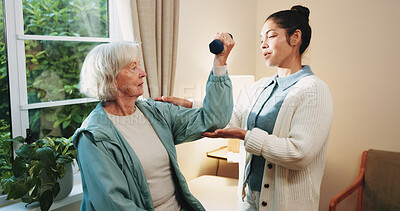 Buy stock photo Dumbbell, fitness and senior woman with therapist in retirement home for healthcare or wellness. Help, rehabilitation and weights with old person in physio for consulting, exercise or improvement