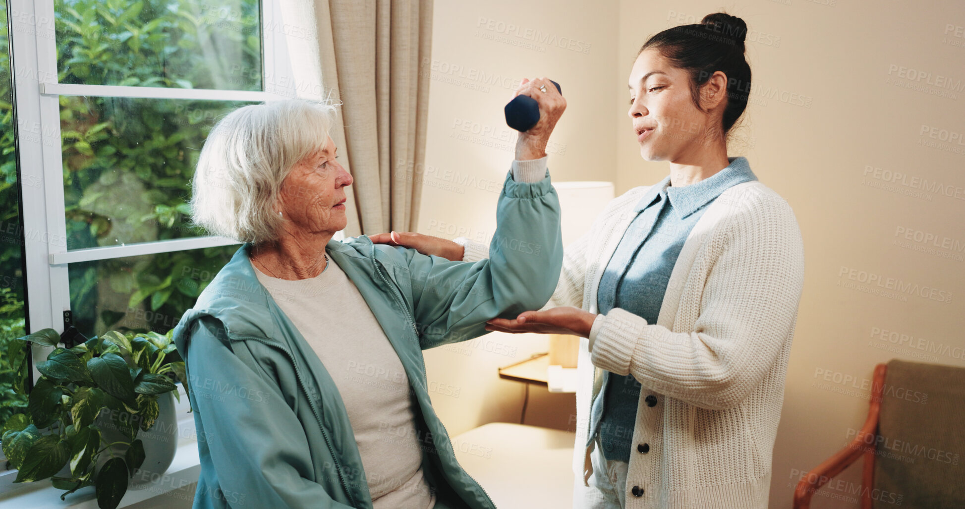 Buy stock photo Dumbbell, fitness and senior woman with therapist in retirement home for healthcare or wellness. Help, rehabilitation and weights with old person in physio for consulting, exercise or improvement