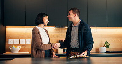 Buy stock photo Handshake, client and smile with handyman in home for invoice agreement, repair plan and consulting. Plumbing solution, kitchen renovation quote and shaking hands with people for inspection clipboard