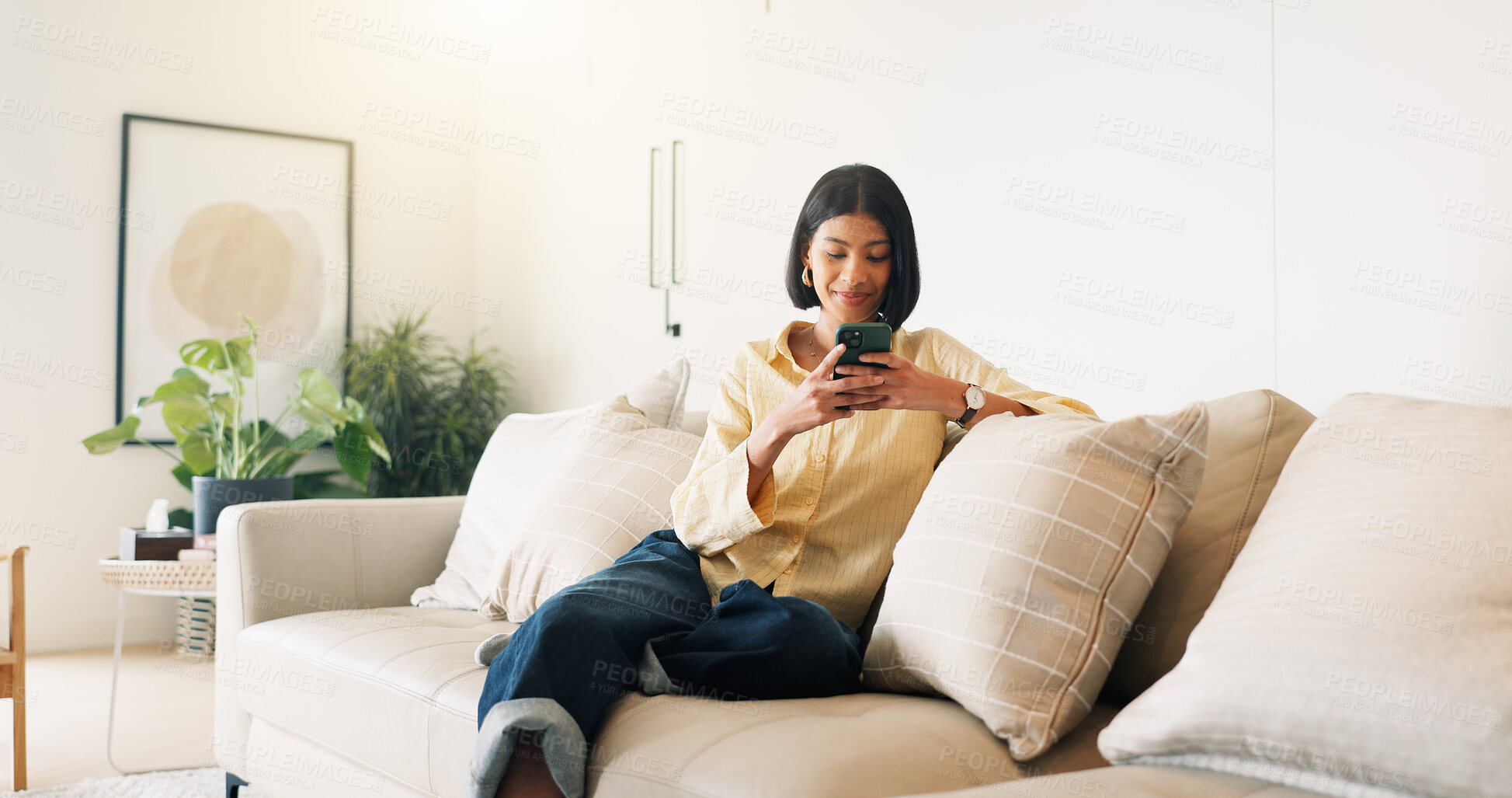 Buy stock photo Text, connection and woman in house with phone, online chat or post update on social media app. Reading, contact or happy person with tech, message notification or communication on digital platform.