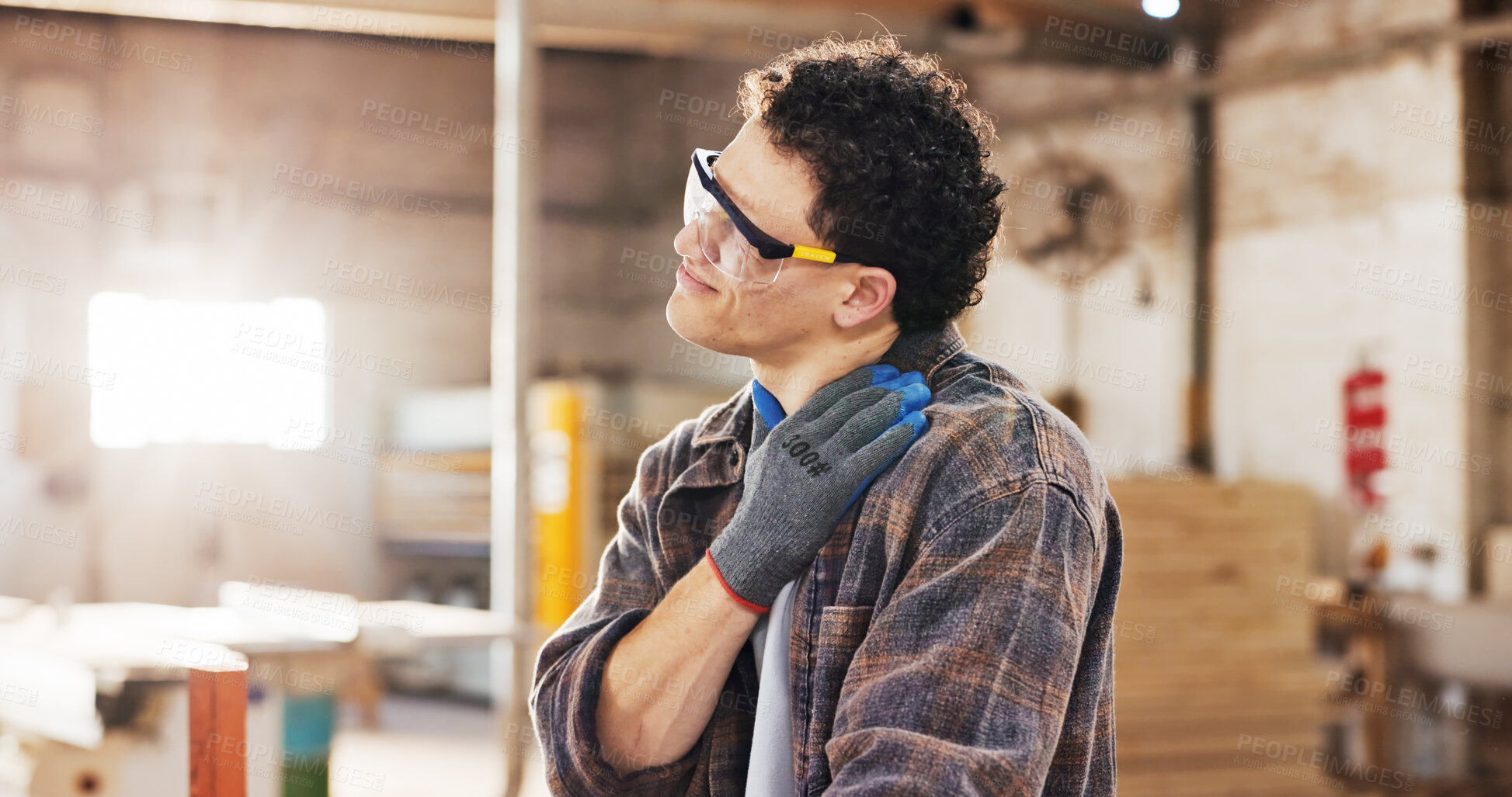 Buy stock photo Carpenter, injury and man in workshop with shoulder pain for manufacturing, massage and accident. Person, hurt and warehouse with strain for custom or handmade woodworking, dislocation and timber