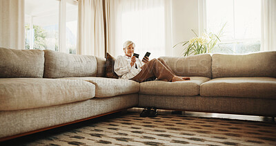 Buy stock photo Happy woman, relax and phone with credit card in living room, e commerce or online deal on app. Mature, person and smile with cellphone for internet banking, shopping or payment on webshop at home