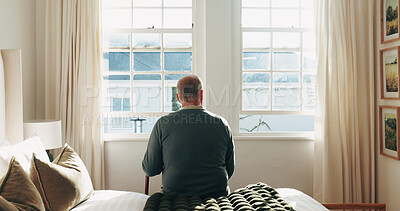 Buy stock photo Thinking, window and back of senior man in bedroom for nostalgia, remember or reflection. Walking stick, dementia and elderly person in retirement on bed for relax, memory or flashback in house