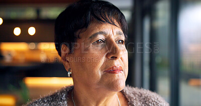 Buy stock photo Thinking, serious and senior woman in home with reflection, remember or memory on retirement. Window, relax and elderly person in living room with nostalgia, decision or choice on pension in house.