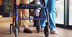 Legs, physiotherapy and walker with people in clinic together for balance or stability. Healthcare, rehabilitation and walking frame on wheels for exercise or recovery of patient in wellness session