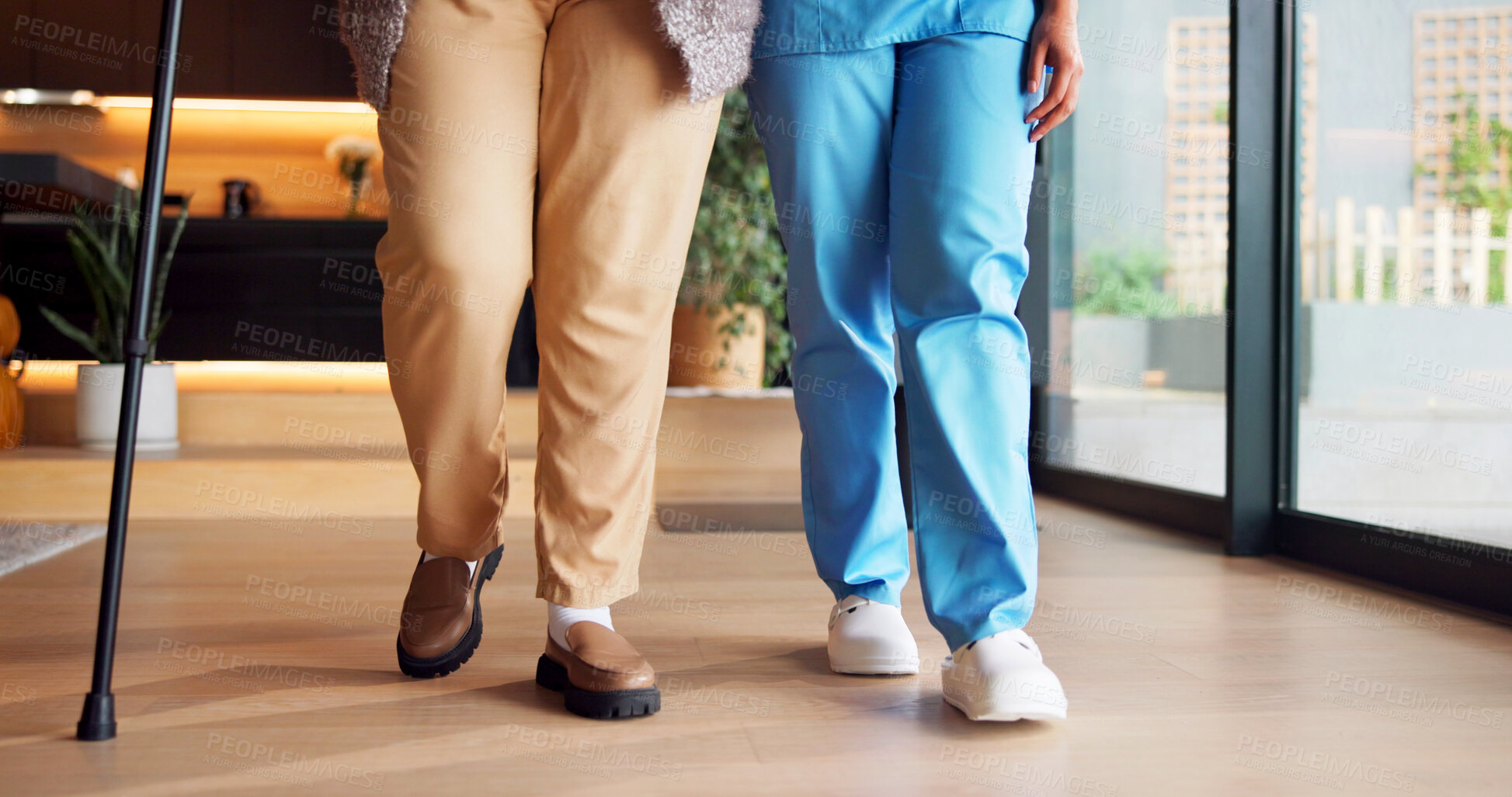 Buy stock photo Support, nurse and patient in house with walking stick, muscle recovery and mobility aid in living room. Health, caregiver and person with disability, rehabilitation or assistance in home visit.