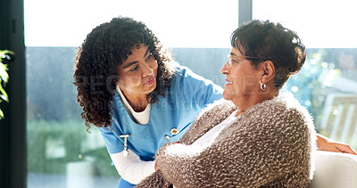 Buy stock photo Advice, support and nurse with senior woman on sofa in retirement home for medical checkup. Comfort, conversation and caregiver with elderly patient in living room for healthcare service in house.