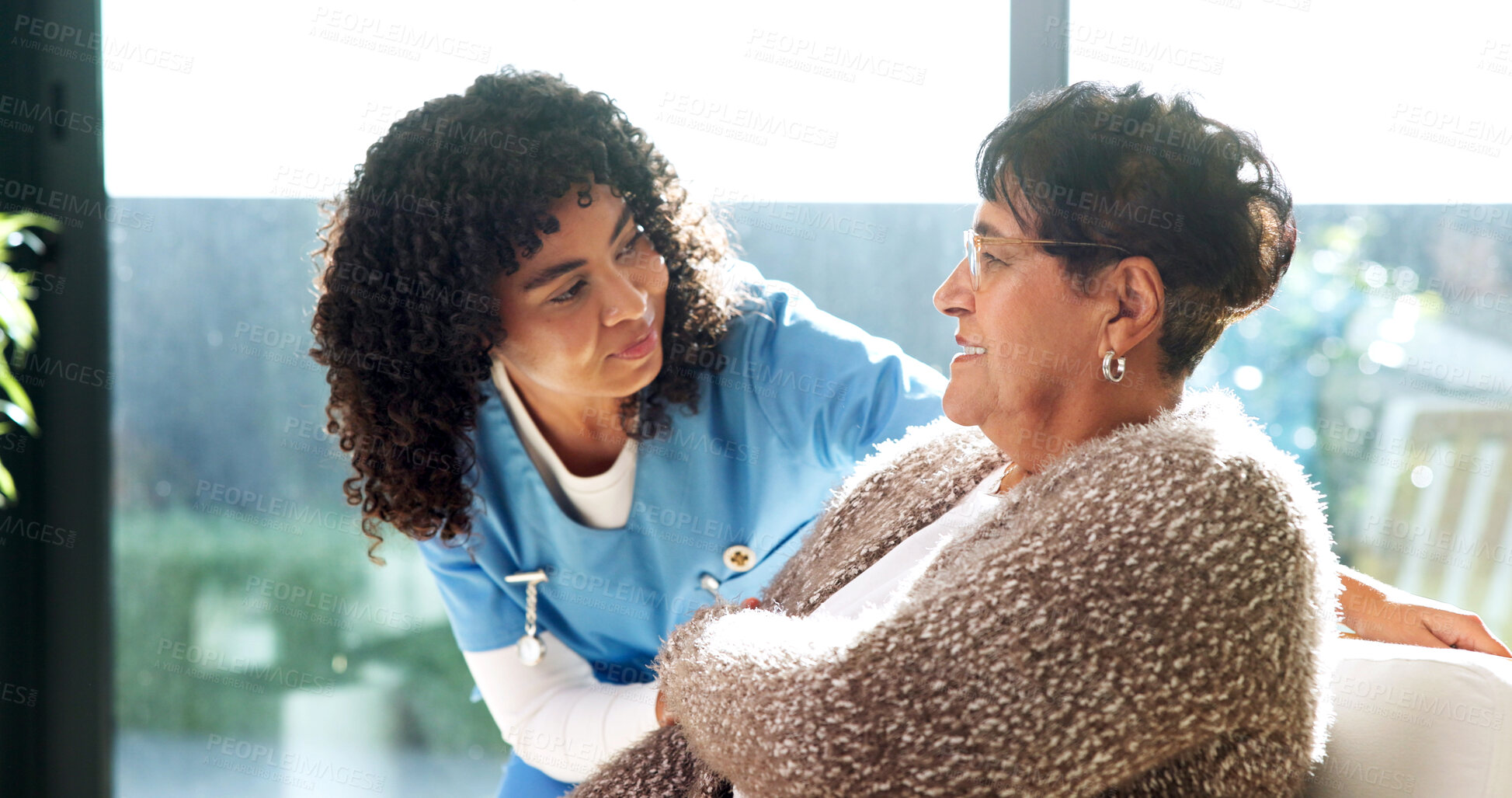 Buy stock photo Advice, support and nurse with senior woman on sofa in retirement home for medical checkup. Comfort, conversation and caregiver with elderly patient in living room for healthcare service in house.